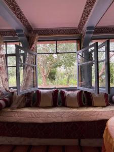 Postel nebo postele na pokoji v ubytování Palmas Magramane