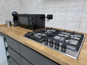 Kuchyň nebo kuchyňský kout v ubytování Rho Fiera Flat