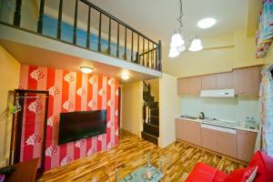 Kuchyň nebo kuchyňský kout v ubytování Miaoli Sanyi Bo Wu Guan Homestay
