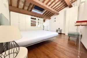 Ένα ή περισσότερα κρεβάτια σε δωμάτιο στο S318 - Sirolo, meraviglioso trilocale in palazzo storico