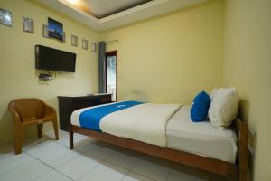 Μια τηλεόραση ή/και κέντρο ψυχαγωγίας στο Rehat at Wahidin Guest House