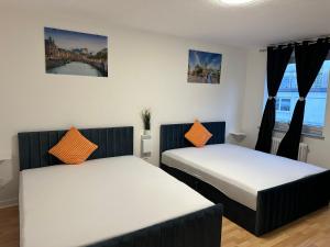 Ένα ή περισσότερα κρεβάτια σε δωμάτιο στο Ferienwohnung im Hamburger Straße 134