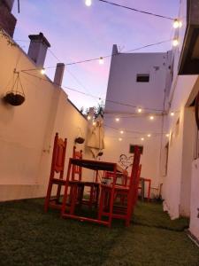 En terrasse eller udendørsområde på Hostel IL POINT