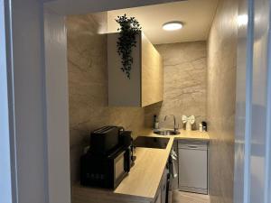 Η κουζίνα ή μικρή κουζίνα στο Ferienwohnung im Hamburger Straße 134