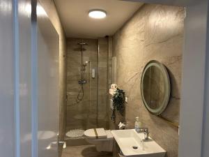 Ένα μπάνιο στο Ferienwohnung im Hamburger Straße 134 +19 φωτογραφίες