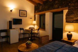 Una televisión o centro de entretenimiento en Il Rustico