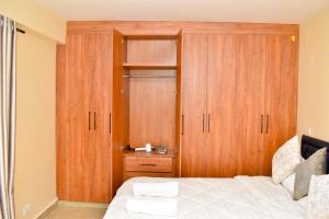 Ένα ή περισσότερα κρεβάτια σε δωμάτιο στο Carlton Stays