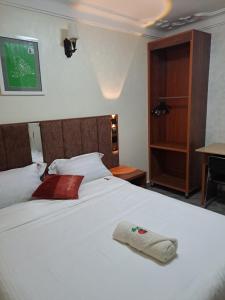 Postel nebo postele na pokoji v ubytování Ritz Motel