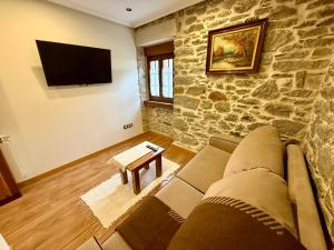 Μια τηλεόραση ή/και κέντρο ψυχαγωγίας στο Casa Rural Bango