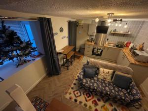 Η κουζίνα ή μικρή κουζίνα στο 3 Stable Mews