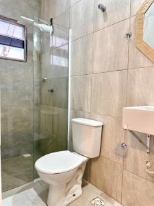 Et badeværelse på Casa Aconchegante em Hortolândia