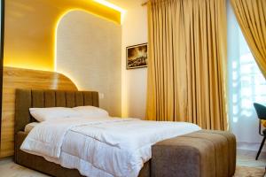 Ένα ή περισσότερα κρεβάτια σε δωμάτιο στο OTamazingapartment