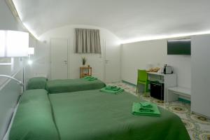 Televiisor ja/või meelelahutuskeskus majutusasutuses Amendola Dream