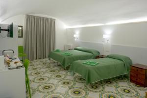 Voodi või voodid majutusasutuse Amendola Dream toas