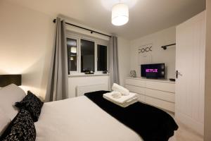 Giường trong phòng chung tại Stowe Hideout