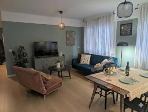 TV a/nebo společenská místnost v ubytování Apartamento enbata