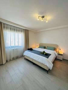 En eller flere senge i et værelse på Joli f3 a Gambetta - king bed - fast internet - 100m2