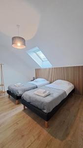 En eller flere senge i et værelse på Maison tout confort proche Azay-le-Rideau 8 p