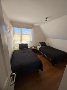 Postel nebo postele na pokoji v ubytování Apart Hotel Chillán - Platinum house - Parking - Wifi - Factura