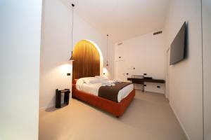 Et tv og/eller underholdning på Donna Isabella - Boutique Rooms