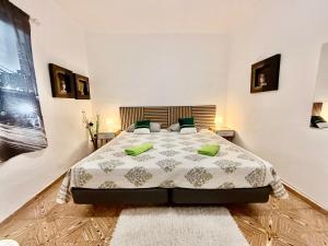 Кровать или кровати в номере Rooms La Laja 2