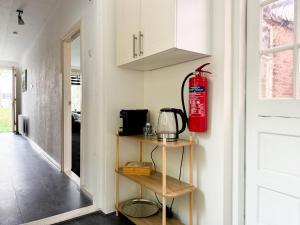 En eller flere senge i et værelse på Business Accommodation in Dordrecht for Expats