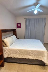 Postel nebo postele na pokoji v ubytování Aconchego III + 5 fotografií