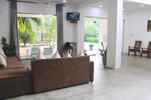 Μια τηλεόραση ή/και κέντρο ψυχαγωγίας στο Savendro Villa Hikkaduwa