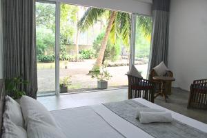 Κήπος έξω από το Savendro Villa Hikkaduwa