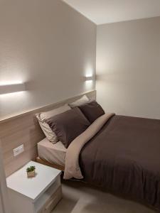 En eller flere senge i et værelse på Appartamento Tulipano