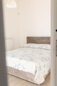 Postel nebo postele na pokoji v ubytování Villa Morella Pool & Sea - Appartamento Moderno