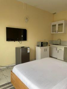 Μια τηλεόραση ή/και κέντρο ψυχαγωγίας στο Exactly one minute away from Victoria Mall