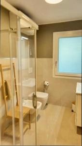 Et badeværelse på Appartamento Tulipano