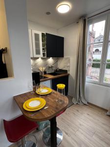 TV a/nebo společenská místnost v ubytování Appartement Le Signature + 16 fotografií