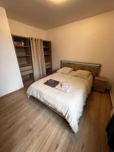 Postel nebo postele na pokoji v ubytování Appartement Le Signature