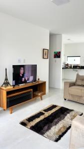 Μια τηλεόραση ή/και κέντρο ψυχαγωγίας στο Casa Malfada linda +12 φωτογραφίες