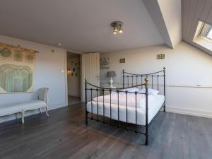 Ένα ή περισσότερα κρεβάτια σε δωμάτιο στο Woning - Onderwijsstraat