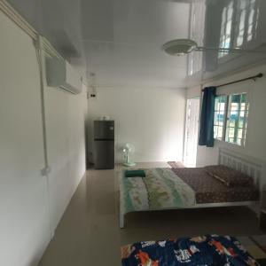 Postel nebo postele na pokoji v ubytování PA House Apartment