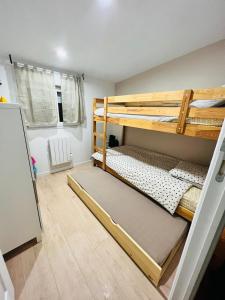 En eller flere senge i et værelse på Maison familiale Blois-Chambord