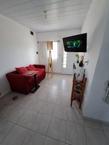 En eller flere senge i et værelse på Casa con 2 habitaciones, patio cerrado, 3 camas