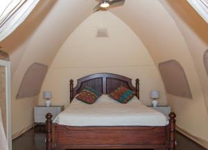 Ένα ή περισσότερα κρεβάτια σε δωμάτιο στο A Slice of Paradise