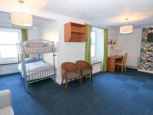 En eller flere senge i et værelse på Bedroom 1