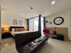 Postel nebo postele na pokoji v ubytování Amoblados Casa de Pinos Bucaramanga