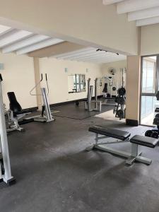 Fitness centrum a/nebo fitness zařízení v ubytování Departamento Centrico con piscina, gimansio y sauna