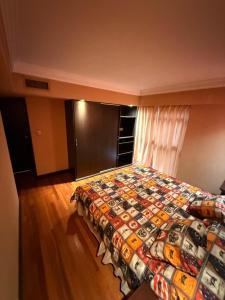 Postel nebo postele na pokoji v ubytování Departamento Centrico con piscina, gimansio y sauna + 4 fotografie