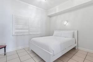 Postel nebo postele na pokoji v ubytování Spacious Three-Bedroom Beachside Condo With Gulf Views + 5 fotografií