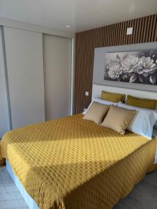 Giường trong phòng chung tại O Refúgio