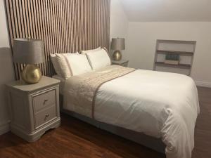 Postel nebo postele na pokoji v ubytování Tranquility