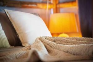 Ένα ή περισσότερα κρεβάτια σε δωμάτιο στο MUUN experience +137 φωτογραφίες