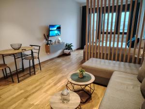 TV a/nebo společenská místnost v ubytování Harmony Dream